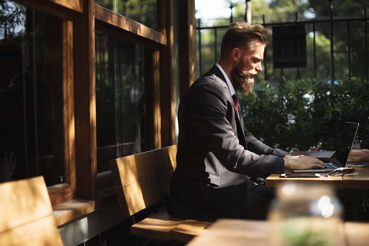 beard, business, business people, cafe, coffee shop, communication, connection, corporate, internet, laptop, man, online, person, suit, table, typing, working, business, business, business, business, business, corporate, corporate, corporate, corporate, typing